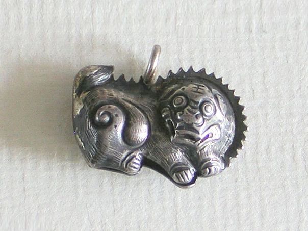 Small bell shaped as a Buddhist Lion – (0188)